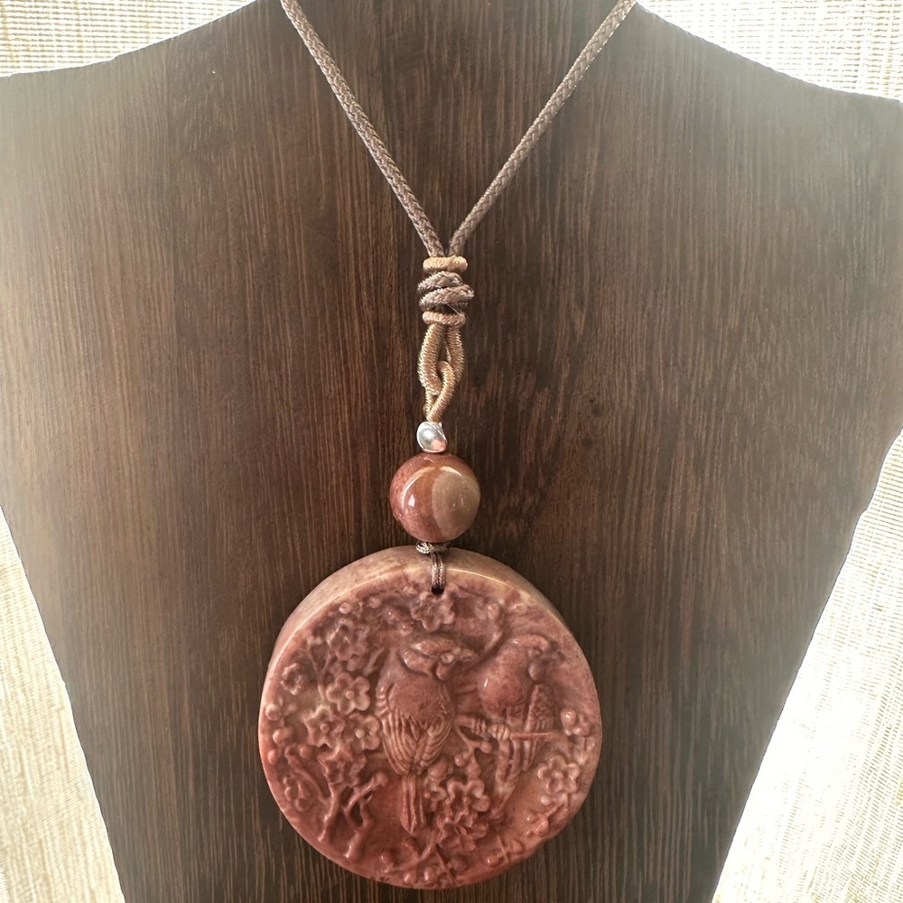 Coral Fossil Carved Round Bird Pendant Necklace on Tan Adjustable Rope - Picture 5 of 13